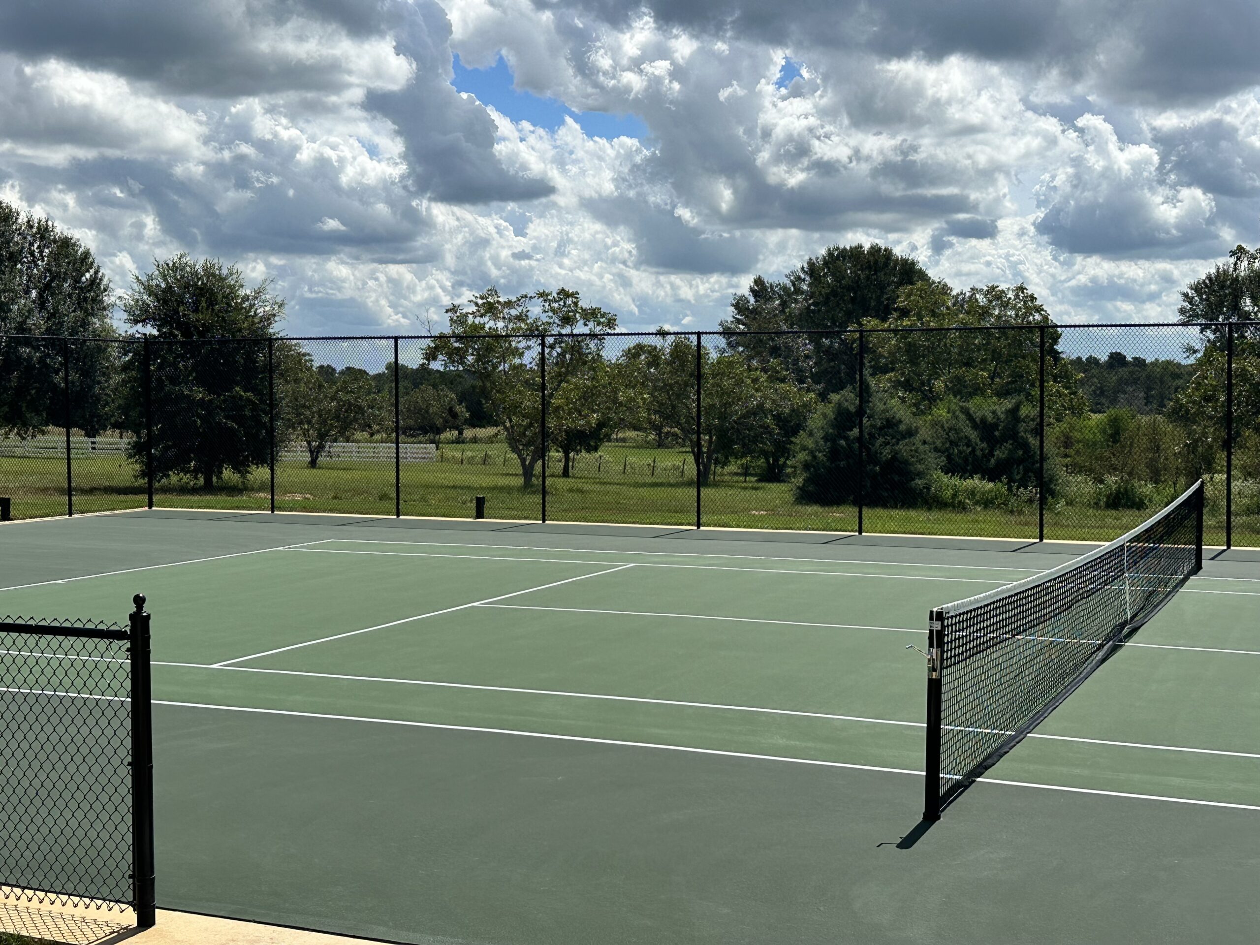 Commercial tennis court construction and facility design