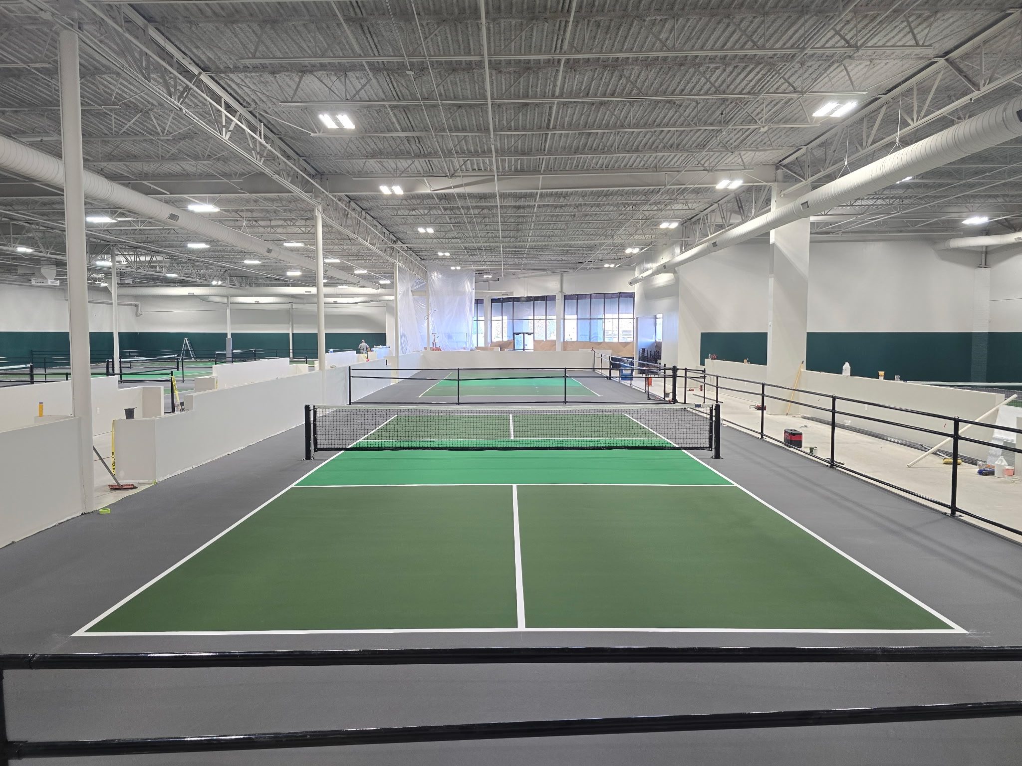 Cushioned court providing superior comfort for frequent play and multiple age groups